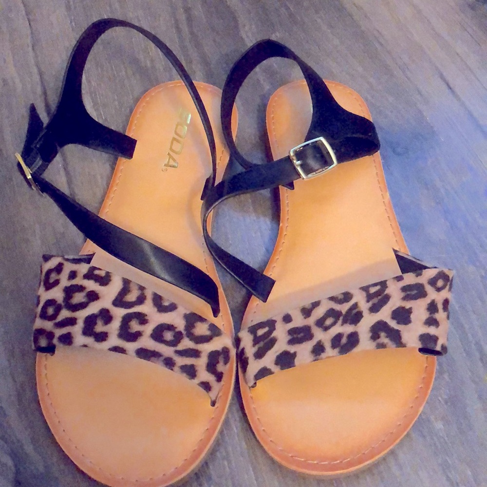 Brand new. Cheetah print sandals